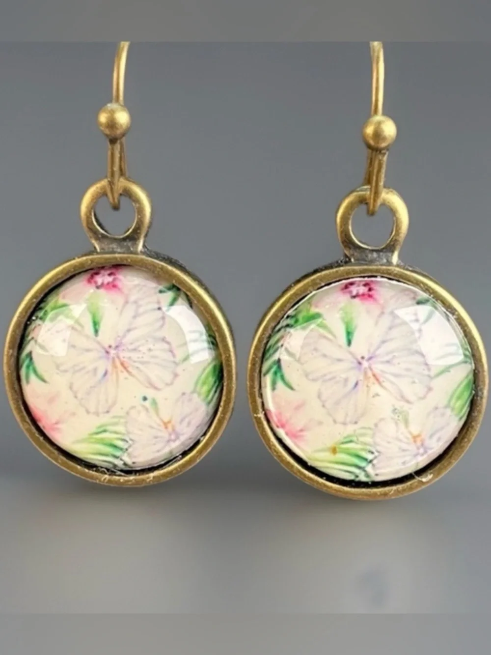 Aged brass tone floral butterfly setting pierced dangle earrings